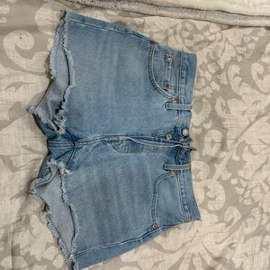 Levi's Blue Jean 501 Shorts with Raw Hem and Mid-Thigh Length